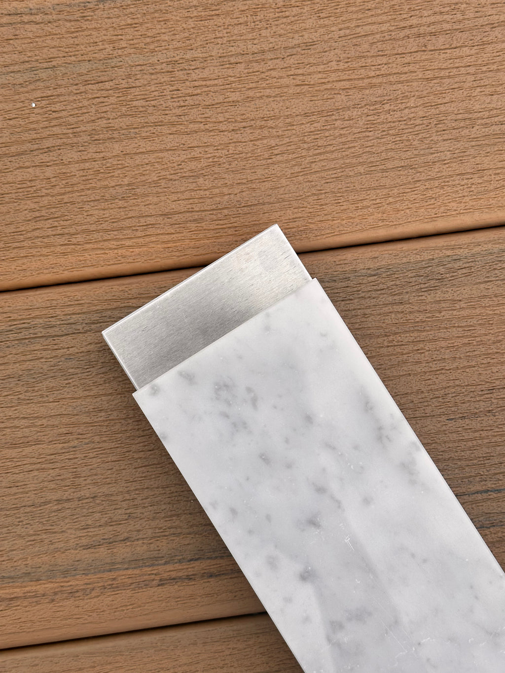 Modular Marble-Metal Fingerboard Pad